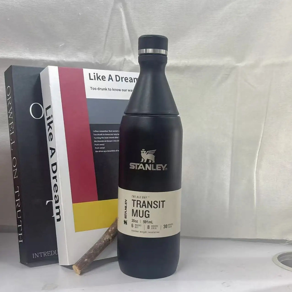 STANLEY Matte Black Wine Bottle Shaped 20oz, Stainless Steel Vacuum Flask, Leakproof Sealed Lid, Cold Heat Retention