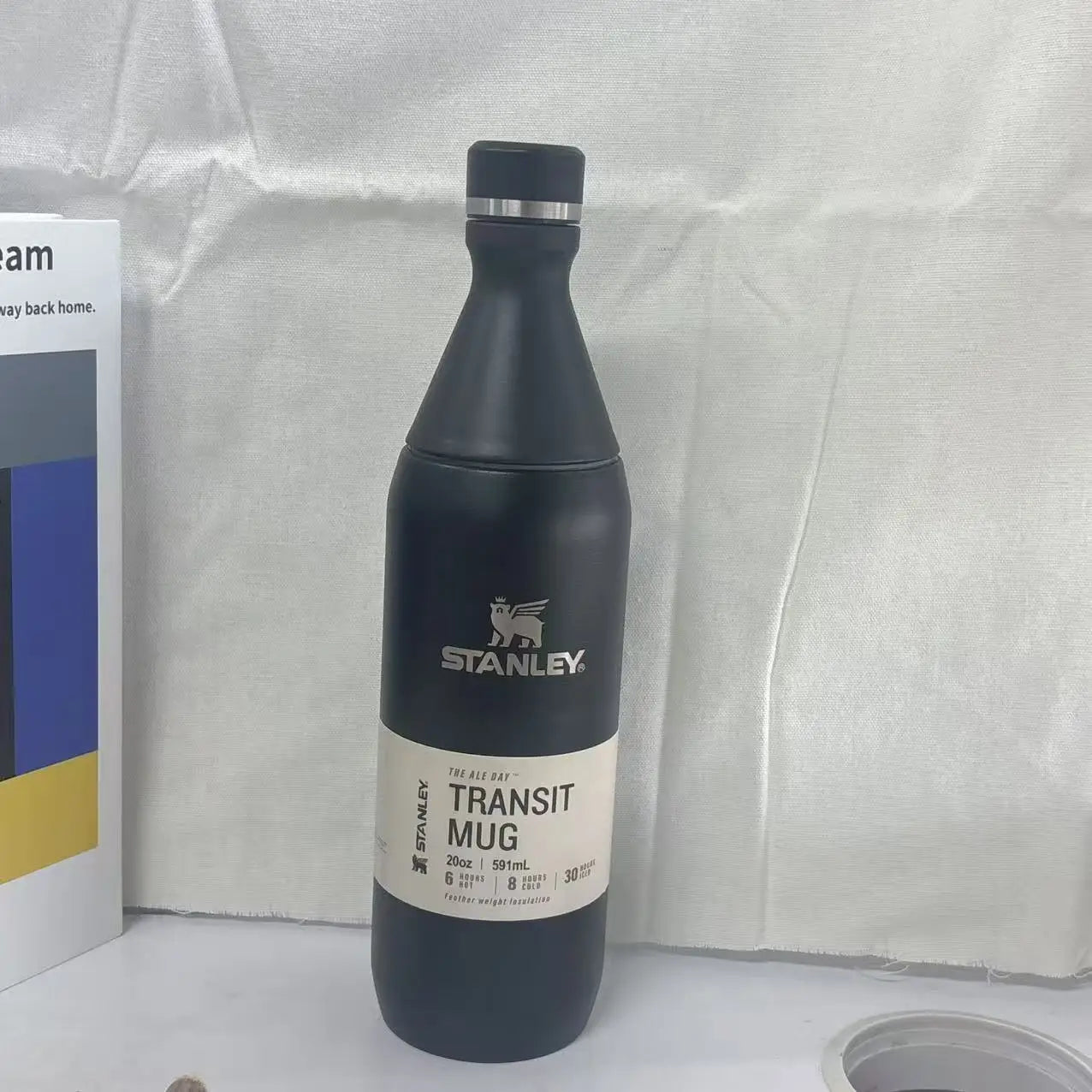STANLEY Matte Black Wine Bottle Shaped 20oz, Stainless Steel Vacuum Flask, Leakproof Sealed Lid, Cold Heat Retention